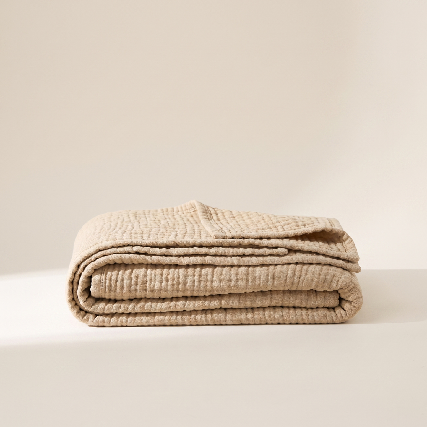 The Brume Blanket — AirLace nine-layer muslin, folded